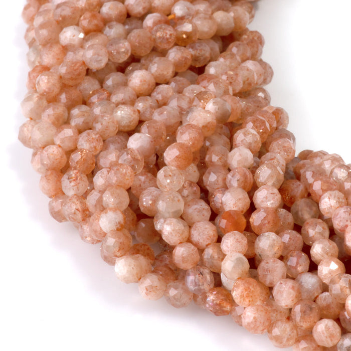 This is a Dakota Stones 4mm Sunstone Microfaceted Gemstone strand with A grade round beads in 15-16 inch strand.