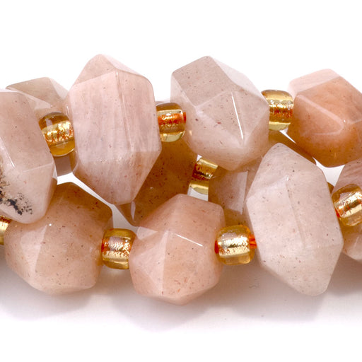 This is a Dakota Stones 6x11mm Sunstone Points Gemstone strand of round beads in 15-16 inch strand.
