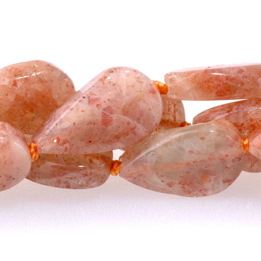This is a Dakota Stones 7x10-8x12mm Golden Sunstone Gemstone strand with tear drop beads in 15-16 inch strand.