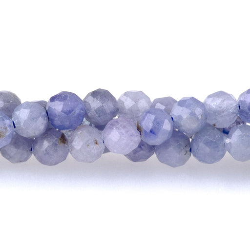 This is a Dakota Stones 4mm Tanzanite Microfaceted Gemstone strand with round beads in 15-16 inch strand.