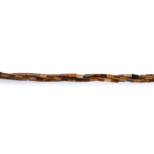 This is a Dakota Stones 2x4mm Tiger Eye Tube Gemstone strand of round beads in 15-16 inch strand.