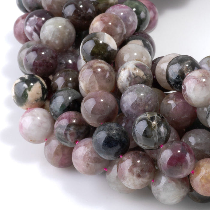 This is a Dakota Stones 10mm Multi Tourmaline Gemstone strand with A grade round beads in 15-16 inch strand.