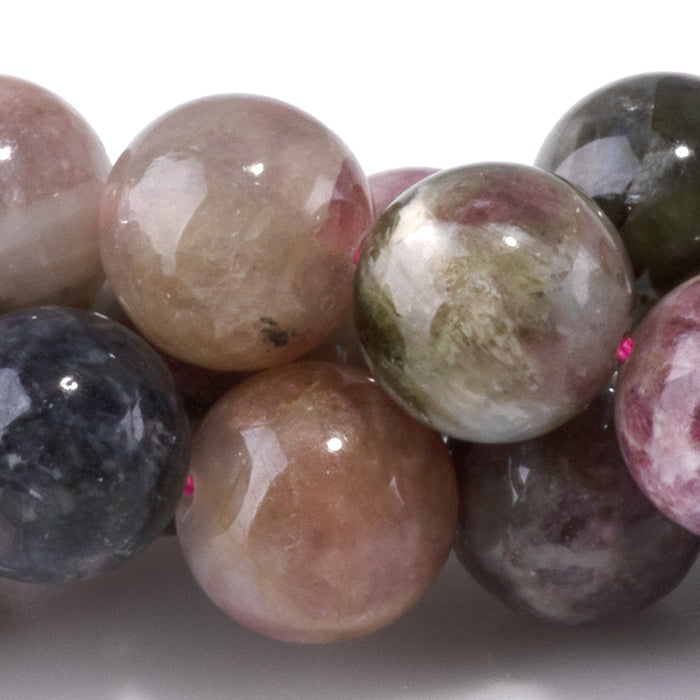 This is a Dakota Stones 10mm Multi Tourmaline Gemstone strand with A grade round beads in 15-16 inch strand.