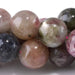 This is a Dakota Stones 10mm Multi Tourmaline Gemstone strand with A grade round beads in 15-16 inch strand.