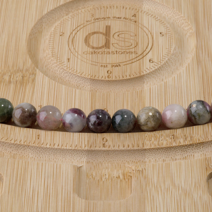 This is a Dakota Stones 10mm Multi Tourmaline Gemstone strand with A grade round beads in 15-16 inch strand.