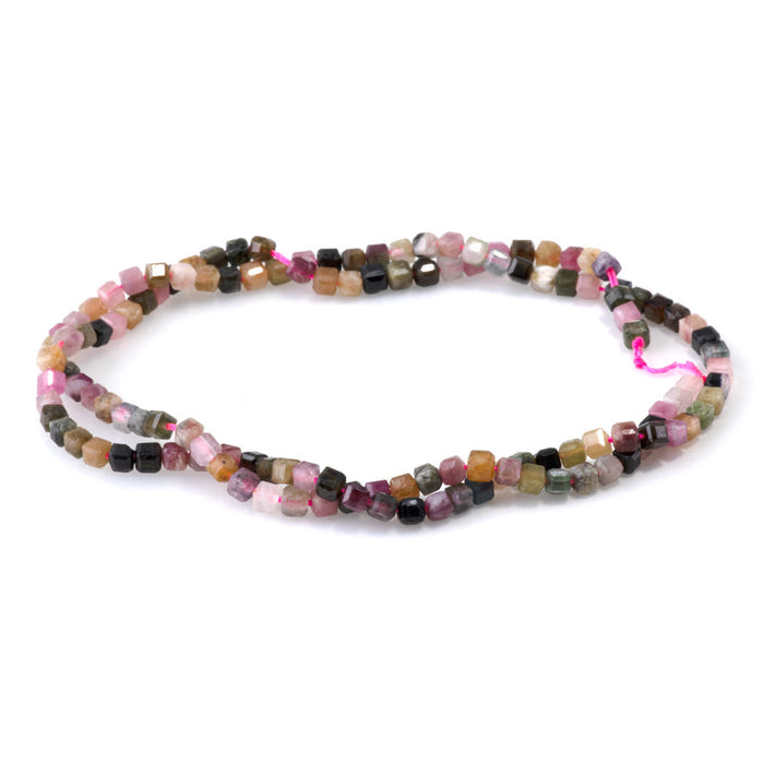 This is a Dakota Stones 3mm Multi Tourmaline Gemstone strand with table cut faceted cube beads in 15-16 inch strand.