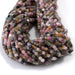 This is a Dakota Stones 3mm Multi Tourmaline Gemstone strand with table cut faceted cube beads in 15-16 inch strand.