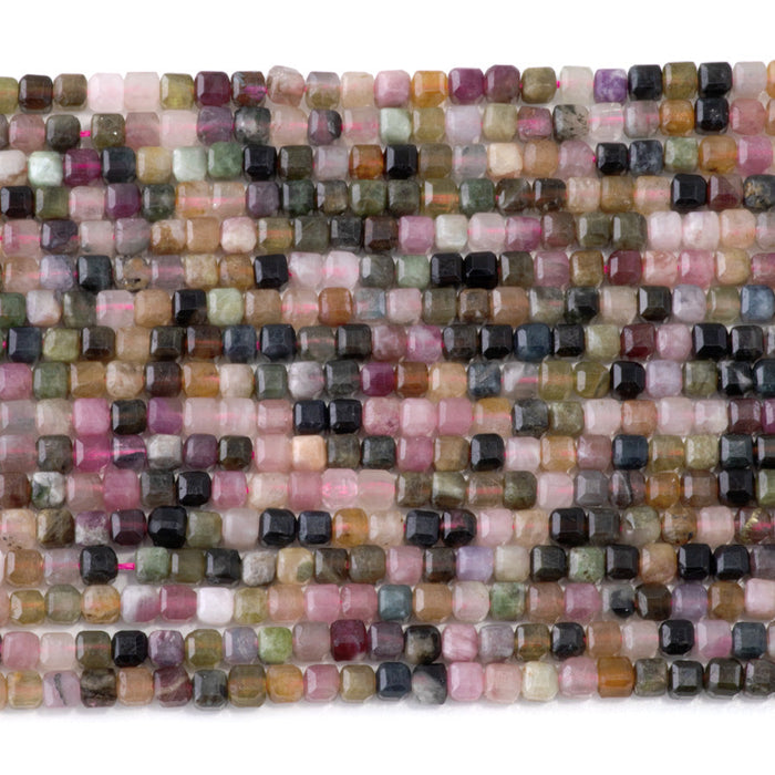 This is a Dakota Stones 3mm Multi Tourmaline Gemstone strand with table cut faceted cube beads in 15-16 inch strand.
