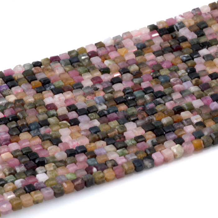 This is a Dakota Stones 3mm Multi Tourmaline Gemstone strand with table cut faceted cube beads in 15-16 inch strand.