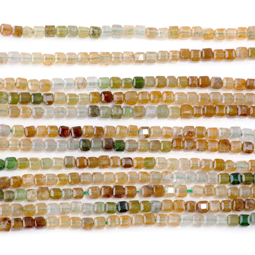 This is a Dakota Stones 3mm Yellow Green Tourmaline Banded Gemstone strand with A grade table-cut cube beads in 15-16 inch strand.