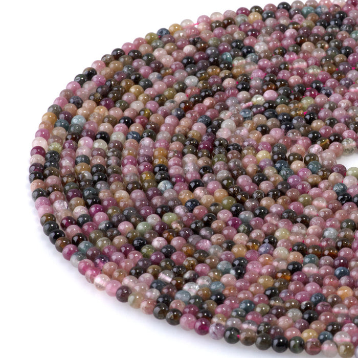 This is a Dakota Stones 3mm Multi Tourmaline Gemstone strand with A grade round beads in 15-16 inch strand.