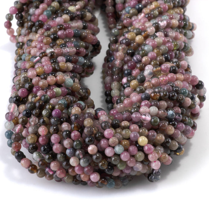 This is a Dakota Stones 3mm Multi Tourmaline Gemstone strand with A grade round beads in 15-16 inch strand.