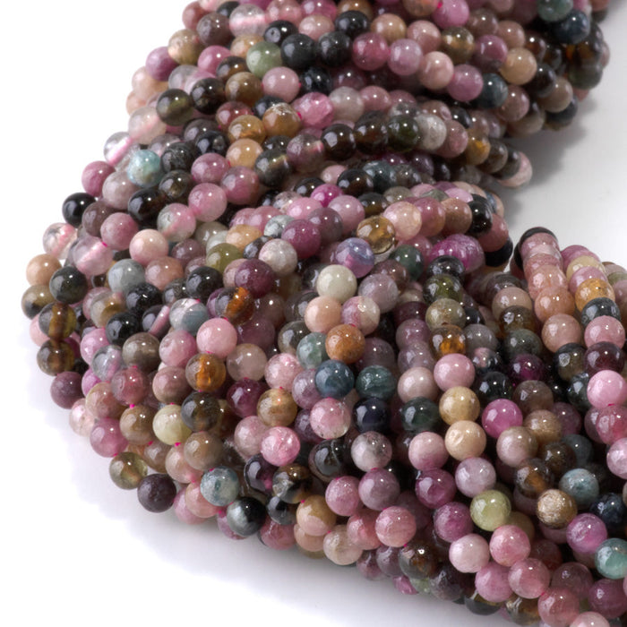 This is a Dakota Stones 3mm Multi Tourmaline Gemstone strand with A grade round beads in 15-16 inch strand.