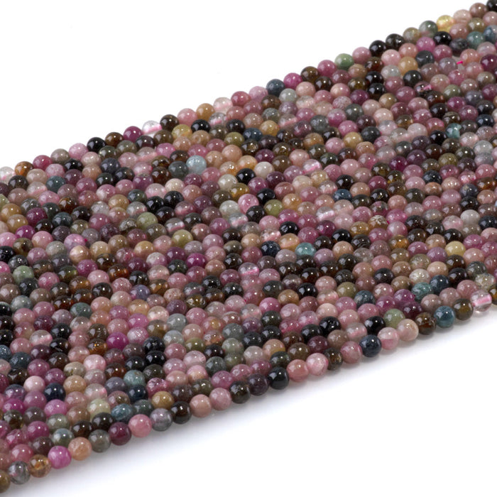 This is a Dakota Stones 3mm Multi Tourmaline Gemstone strand with A grade round beads in 15-16 inch strand.