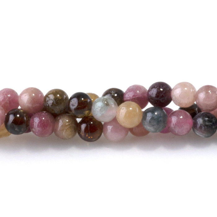 This is a Dakota Stones 3mm Multi Tourmaline Gemstone strand with A grade round beads in 15-16 inch strand.