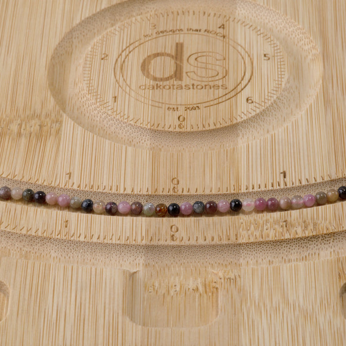This is a Dakota Stones 3mm Multi Tourmaline Gemstone strand with A grade round beads in 15-16 inch strand.