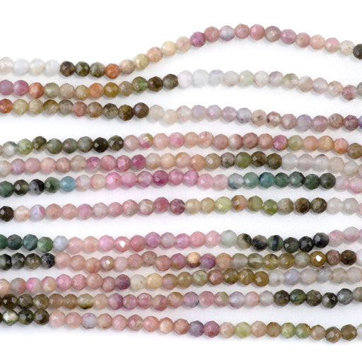 This is a Dakota Stones 3mm Tourmaline Banded Gemstone strand with faceted round beads in 15 inch strand.