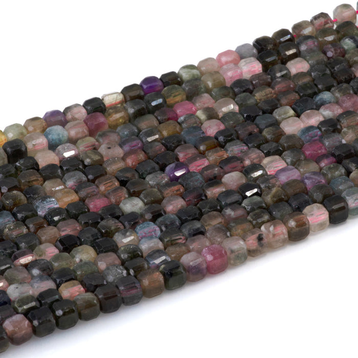 This is a Dakota Stones 4mm Multi Tourmaline Gemstone strand with A grade table cut faceted cube beads in 15-16 inch strand.