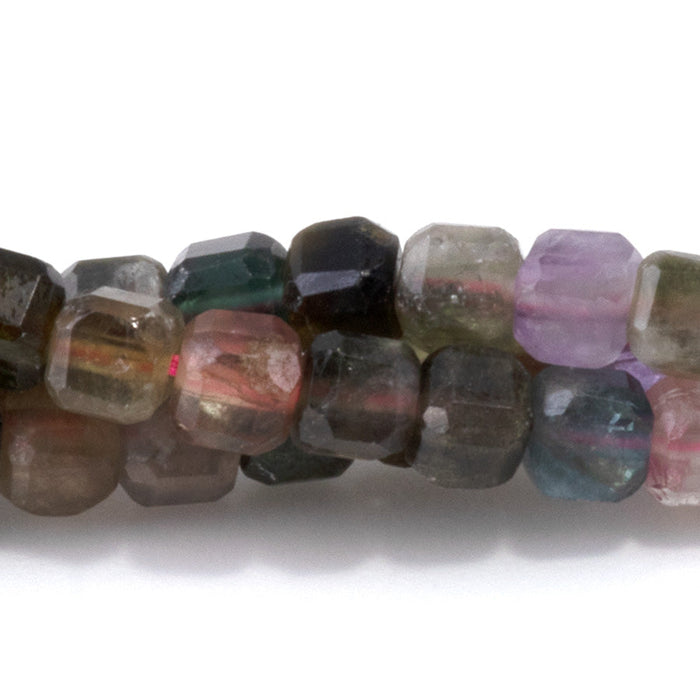 This is a Dakota Stones 4mm Multi Tourmaline Gemstone strand with A grade table cut faceted cube beads in 15-16 inch strand.