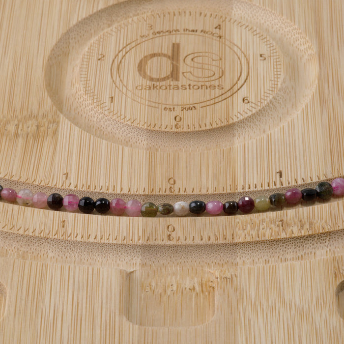 This is a Dakota Stones 4mm Tourmaline Gemstone strand with faceted coin beads in 15-16 inch strand.