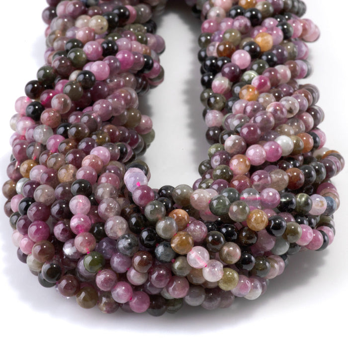 This is a Dakota Stones 4mm Multi Tourmaline Gemstone strand with A grade round beads in 15-16 inch strand.