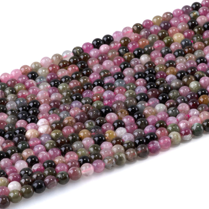 This is a Dakota Stones 4mm Multi Tourmaline Gemstone strand with A grade round beads in 15-16 inch strand.