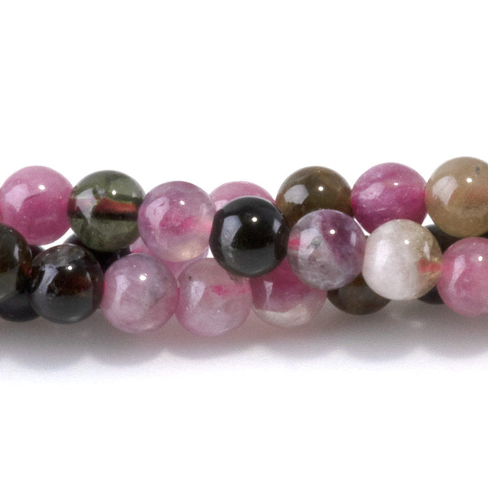 This is a Dakota Stones 4mm Multi Tourmaline Gemstone strand with A grade round beads in 15-16 inch strand.