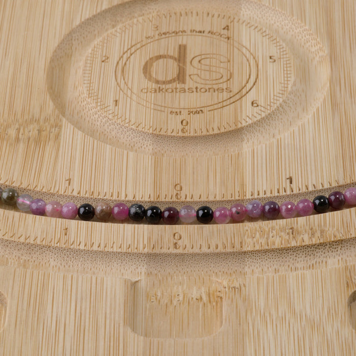 This is a Dakota Stones 4mm Multi Tourmaline Gemstone strand with A grade round beads in 15-16 inch strand.