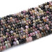 This is a Dakota Stones 4x6mm Multi Tourmaline Gemstone strand with faceted rondelle beads in 15-16 inch strand.