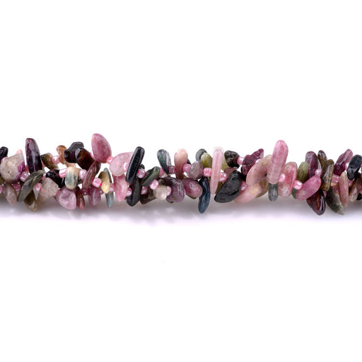 This is a Dakota Stones 5x10-20mm Tourmaline Top Drill Teeth Gemstone strand of round beads in 15-16 inch strand.