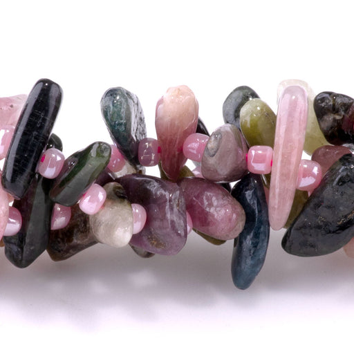 This is a Dakota Stones 5x10-20mm Tourmaline Top Drill Teeth Gemstone strand of round beads in 15-16 inch strand.