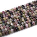 This is a Dakota Stones 5x8mm Multi Tourmaline Gemstone strand with faceted rondelle beads in 15-16 inch strand.