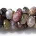 This is a Dakota Stones 5x8mm Multi Tourmaline Gemstone strand with faceted rondelle beads in 15-16 inch strand.