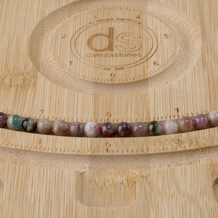 This is a Dakota Stones 6mm Multi Tourmaline Gemstone strand with A grade round beads in 15-16 inch strand.