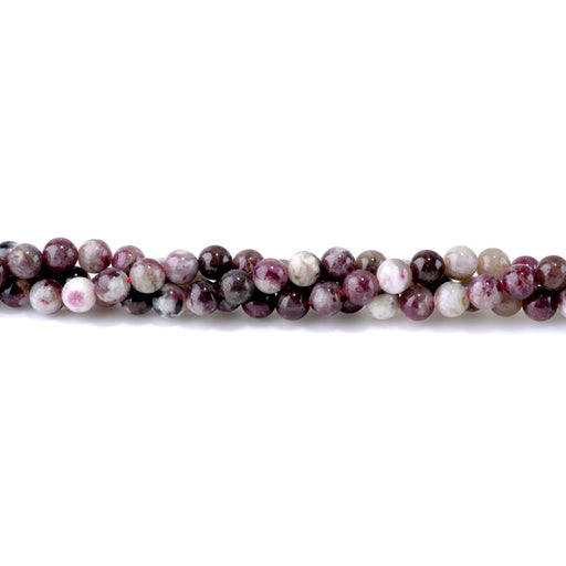 This is a Dakota Stones 6mm Plum Tourmaline Gemstone strand with round beads in 15-16 inch strand.
