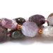This is a Dakota Stones 8mm Multi Tourmaline Gemstone strand with star cut faceted coin beads in 15-16 inch strand.