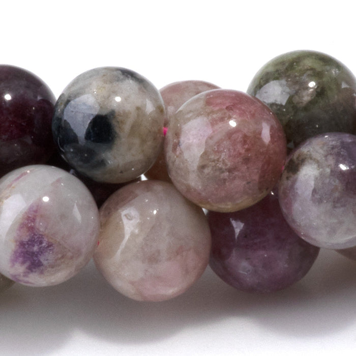 This is a Dakota Stones 8mm Multi Tourmaline Gemstone strand with A grade round beads in 15-16 inch strand.
