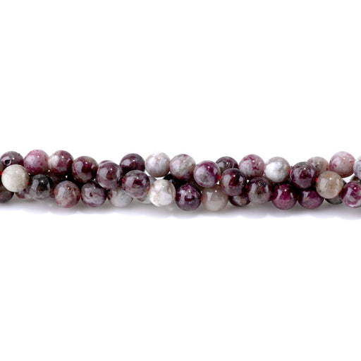 This is a Dakota Stones 8mm Plum Tourmaline Gemstone strand with round beads in 15-16 inch strand.