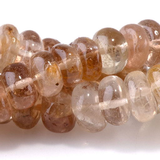 This is a Dakota Stones 8-9mm Imperial Topaz Banded Gemstone strand with rondelle beads in 15-16 inch strand.