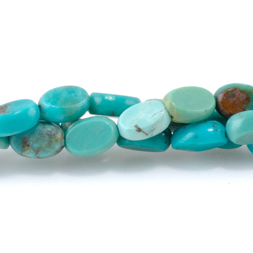 This is a Dakota Stones 4x6mm Hubei Turquoise Flat Blue Gemstone strand with AA grade oval beads in 15-16 inch strand.