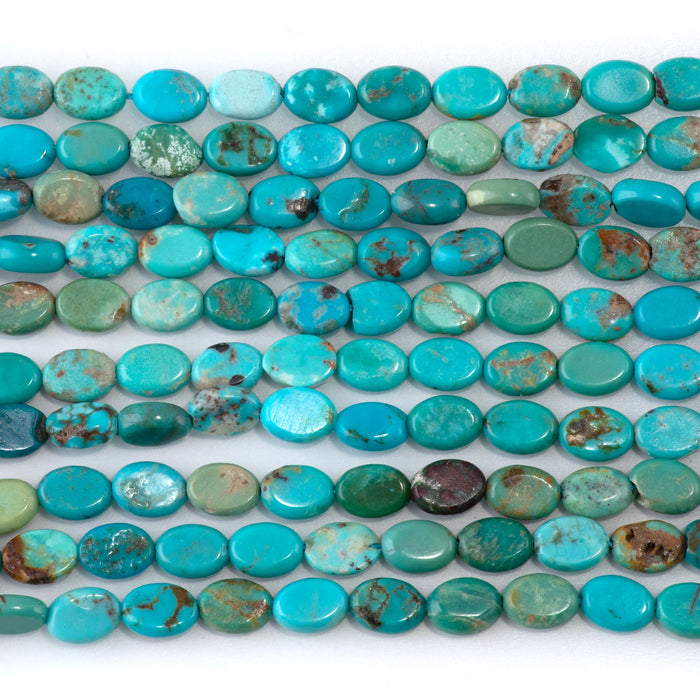 Hubei Turquoise 5x7mm Flat Oval Blue AA Grade - 15-16 Inch