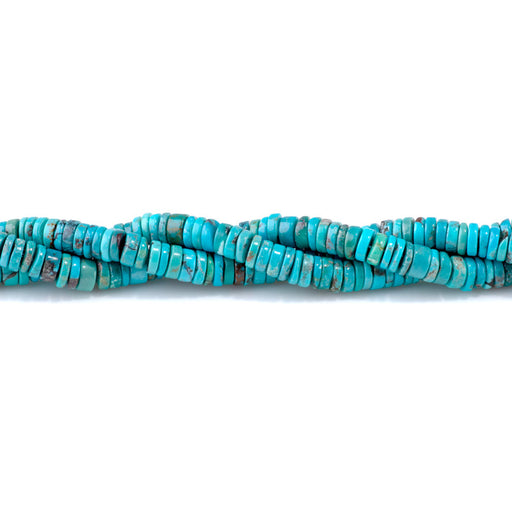 This is a Dakota Stones 2-3x7mm Hubei Turquoise Blue Gemstone strand with heishi beads in 15-16 inch strand.