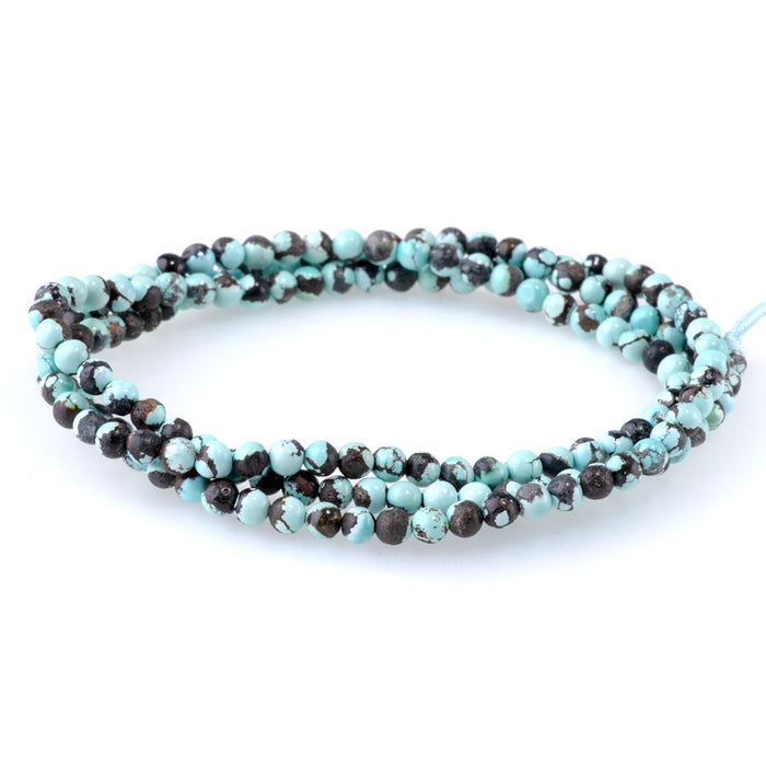 Hubei Turquoise 4mm Pale Blue with Brown Round - 24 Inch