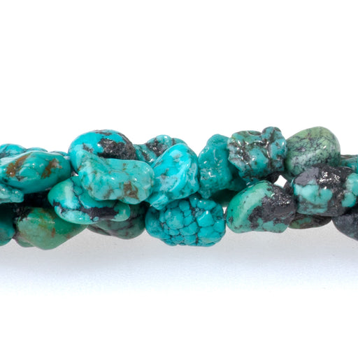 This is a Dakota Stones 4x6-5x8mm Hubei Turquoise Blue Matrix Tiny Gemstone strand with AA grade nugget beads in 15-16 inch strand.