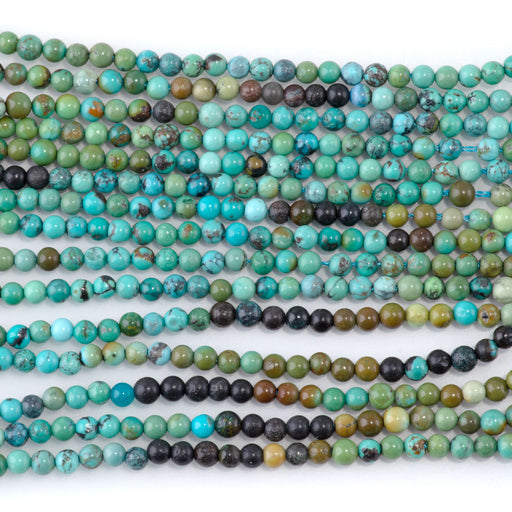 This is a Dakota Stones 3mm Hubei Turquoise Banded Gemstone strand with round beads in 15-16 inch strand.