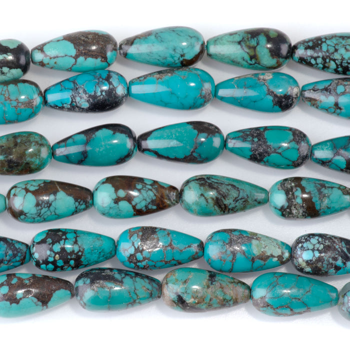 This is a Dakota Stones 8x16mm Hubei Turquoise Gemstone strand with AA grade tear drop beads in 15-16 inch strand.