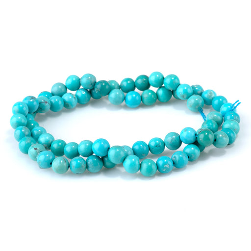 This is a Dakota Stones 6mm Hubei Turquoise Gemstone strand with round beads in 15-16 inch strand.