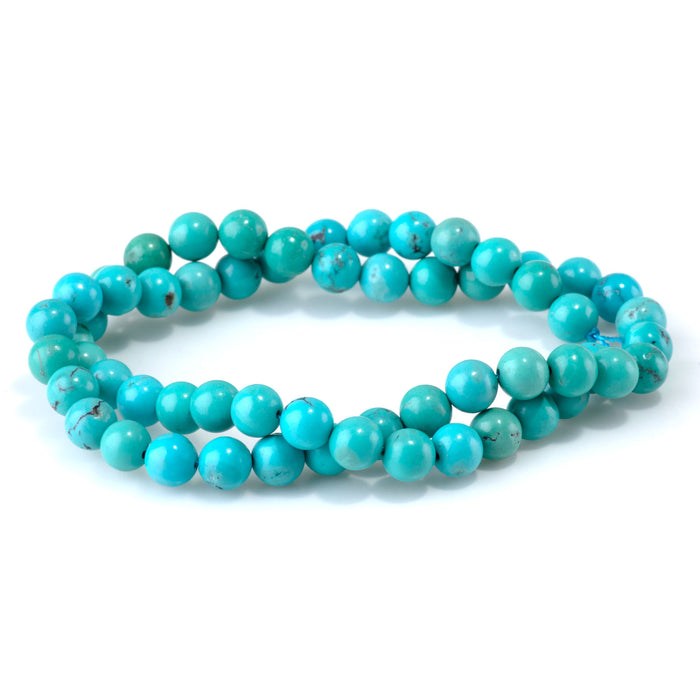 This is a Dakota Stones 6-6mm Hubei Turquoise Gemstone strand with round beads in 15-16 inch strand.