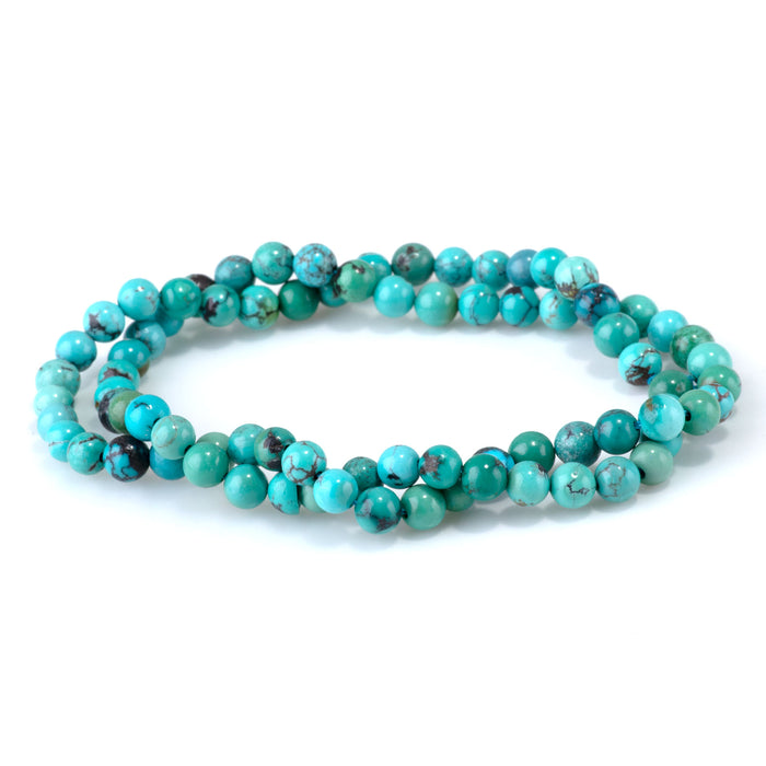 This is a Dakota Stones 5mm Hubei Turquoise Matrix Gemstone strand with round beads in 15-16 inch strand.