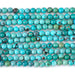 This is a Dakota Stones 5mm Hubei Turquoise Matrix Gemstone strand with round beads in 15-16 inch strand.